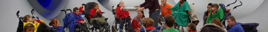Children in wheelchairs in colourscape